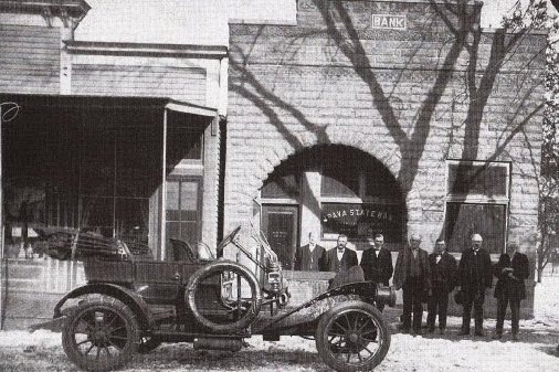 Old car and bank officers