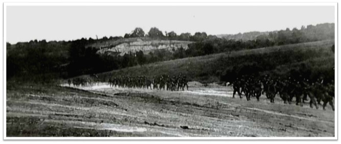 Soldiers Marching in a field