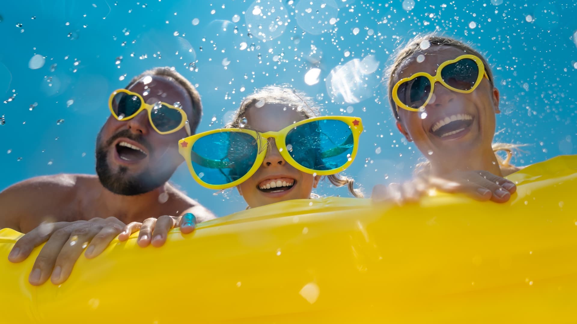 Family swimming together