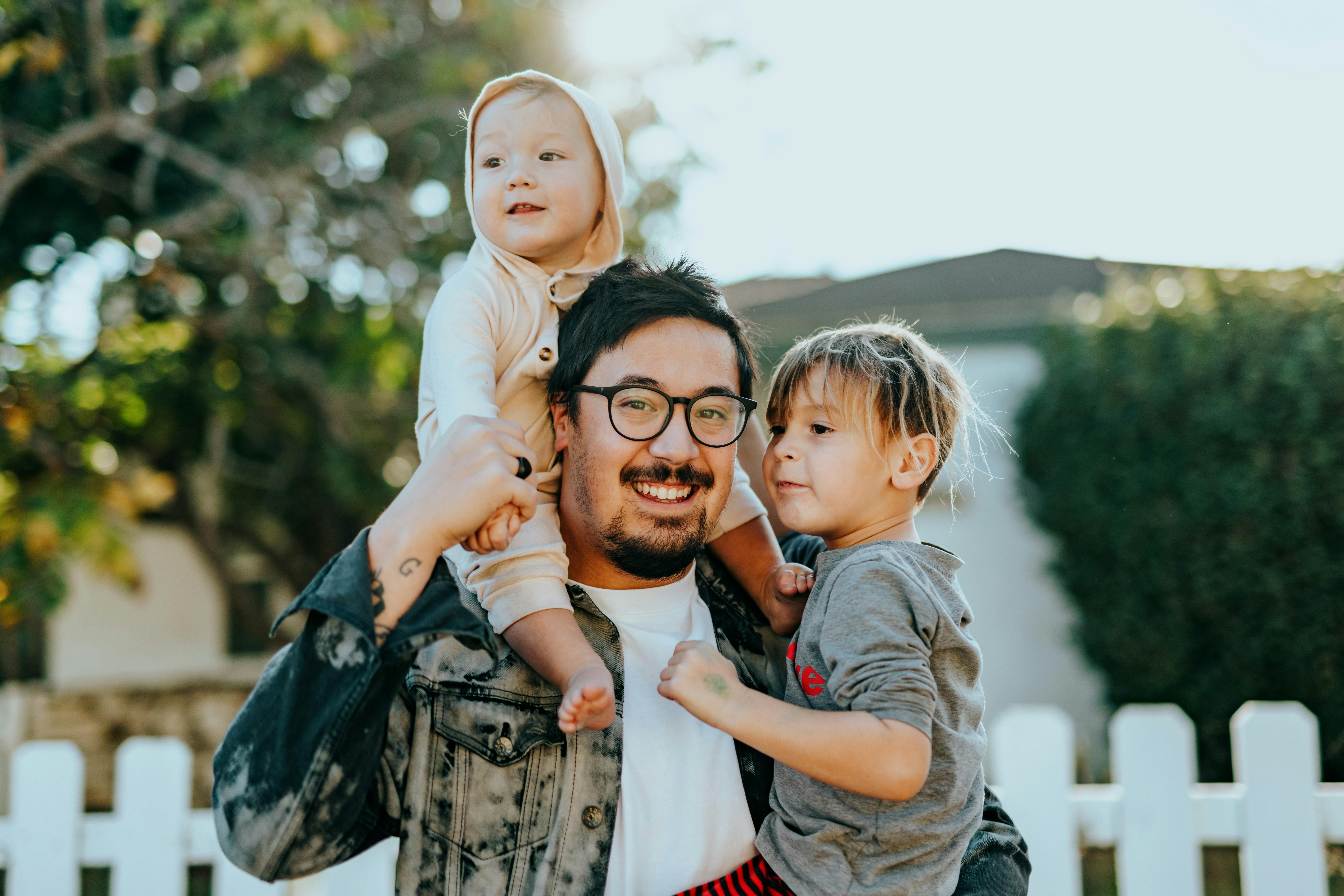 Father Holding his two children
